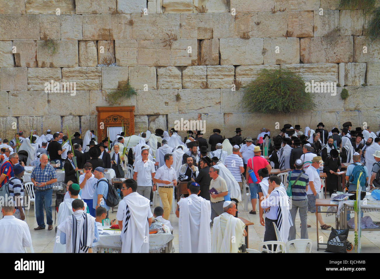 Religious Jews in white prayer shawls Stock Photo