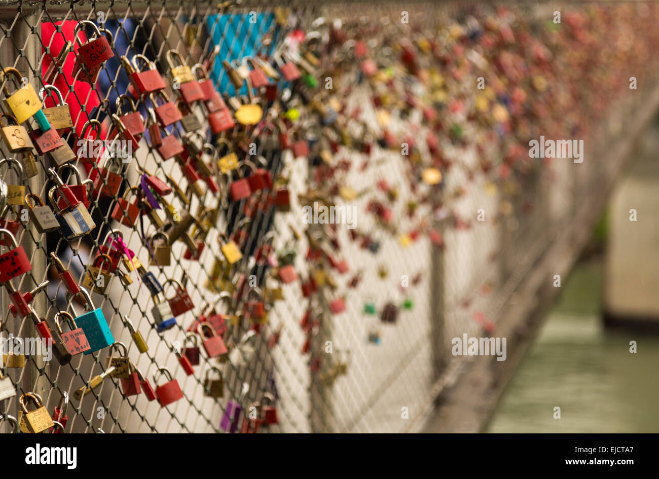 Padlocks on pedestrian bridge Stock Photo