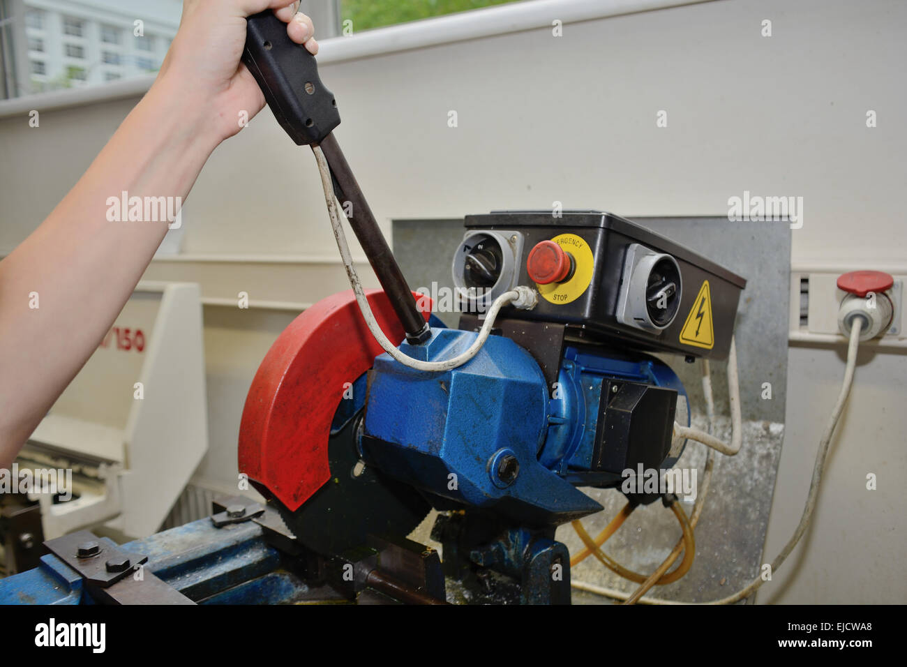 Metal processing with a chop saw Stock Photo