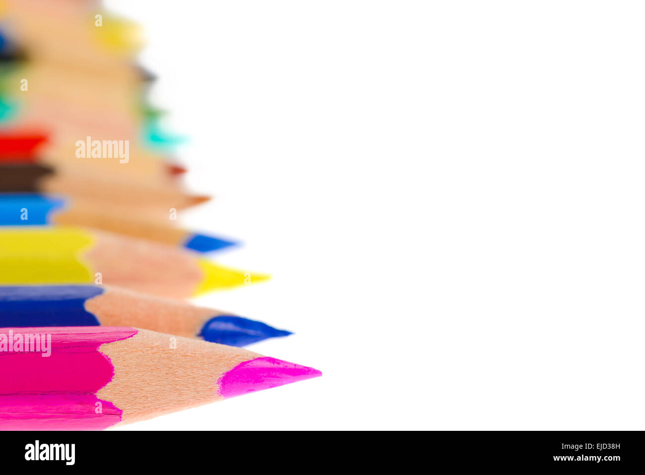 Side view of aligned coloring crayons isolated in white background Stock Photo