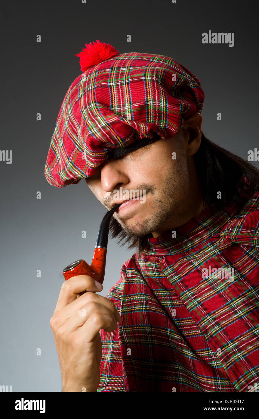 Funny scotsman with smoking pipe Stock Photo Alamy