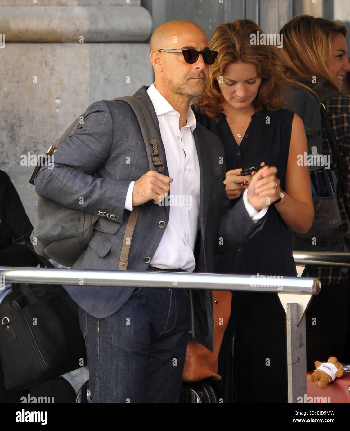 Stanley Tucci and his wife Felicity Blunt arrive at Gare du Nord
