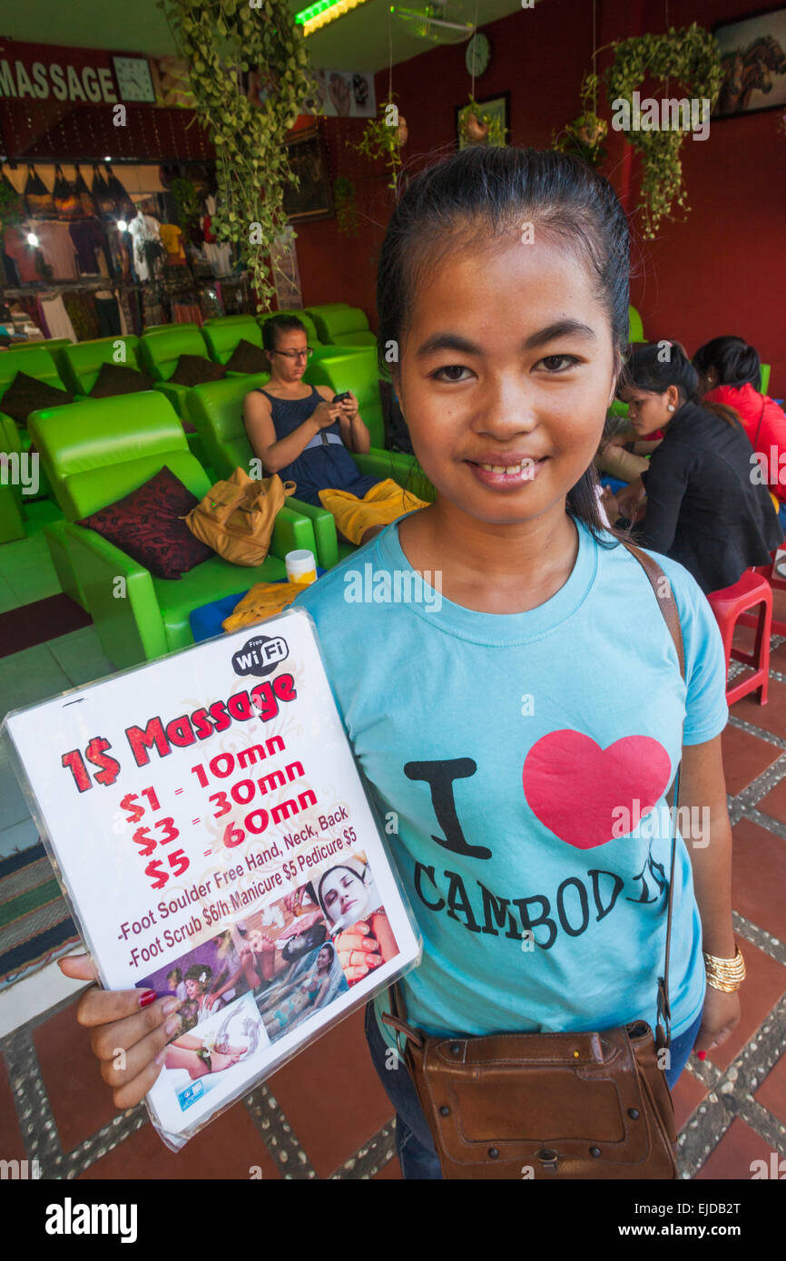 Cambodia, Siem Reap, Girl Holding Massage Menu Stock Photo