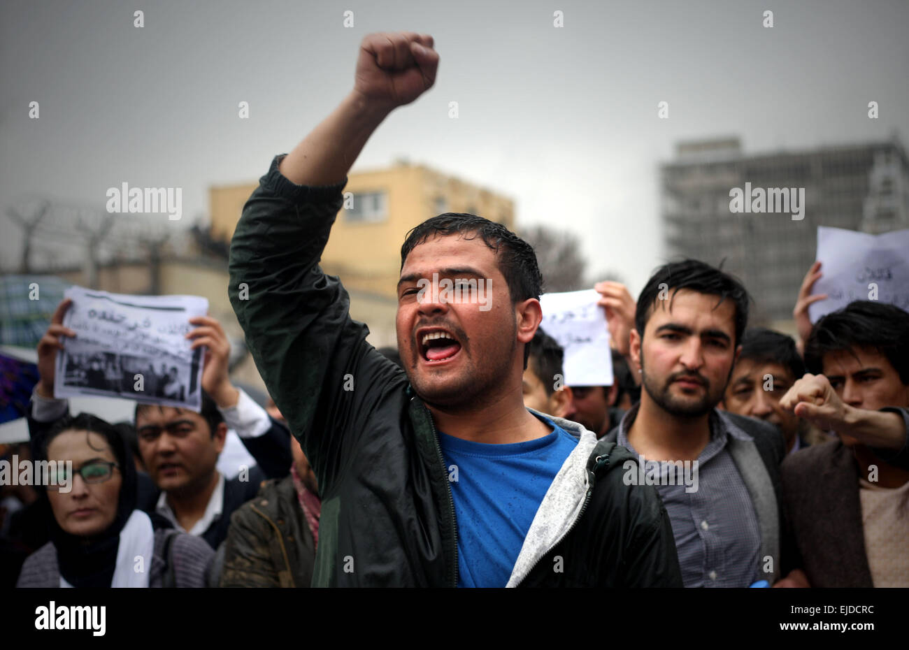 Kabul, Afghanistan. 24th Mar, 2015. Afghan people shout slogans during a protest demanding justice for a woman who was beaten to death in Kabul, Afghanistan, March 24, 2015. An angry mob beat a woman to death and burned her body on March 19 for allegedly burning a copy of the Koran in Kabul, police officials said. Credit:  Ahmad Massoud/Xinhua/Alamy Live News Stock Photo