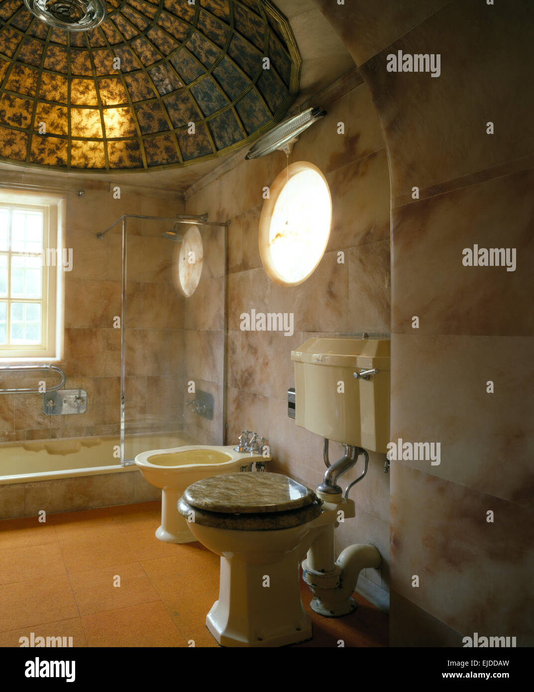 Stained Glass Domed Ceiling Above Bath With Glass Shower Cabinet