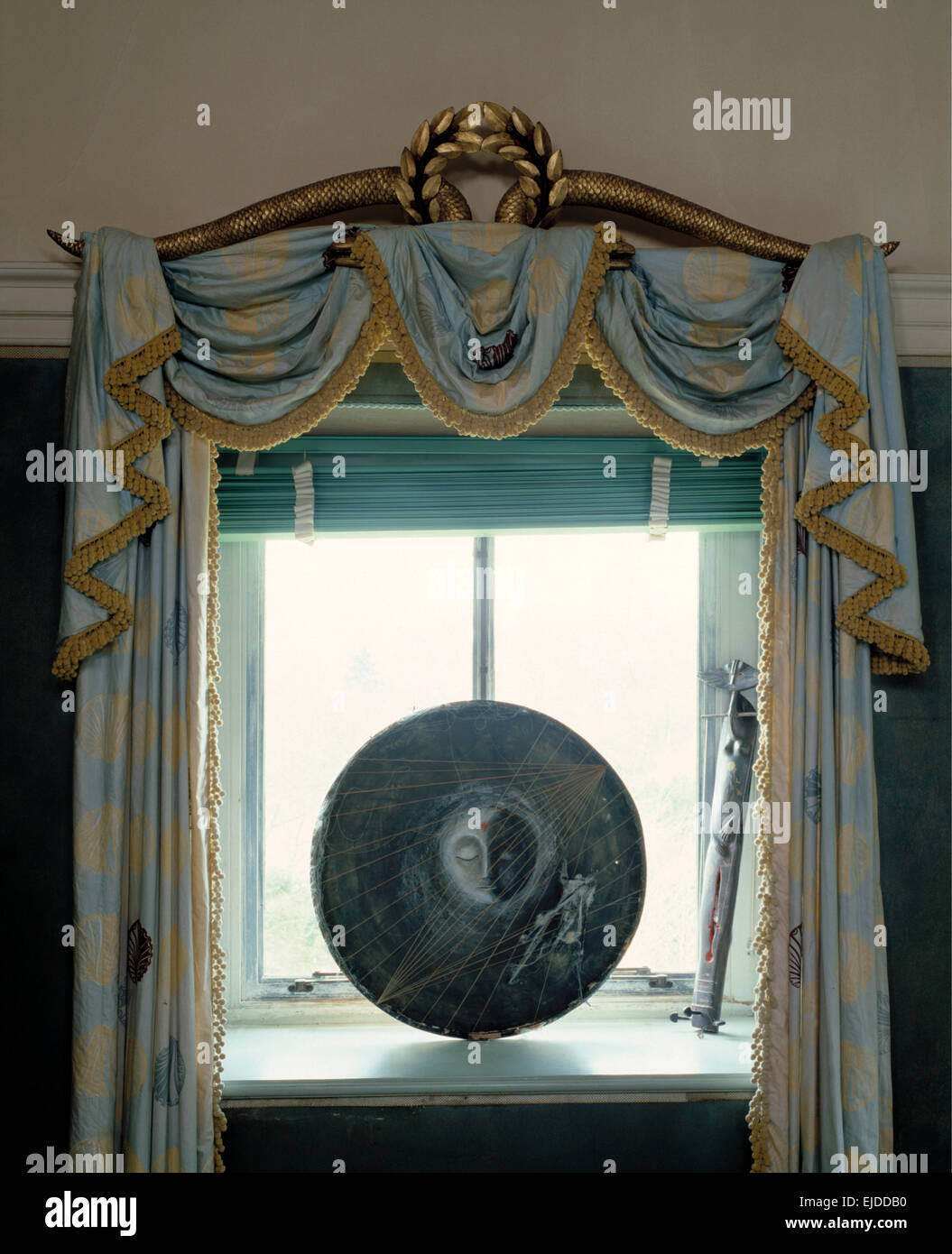 Ornate Gold Trimmed Swagged And Tailed Curtains With Turquoise