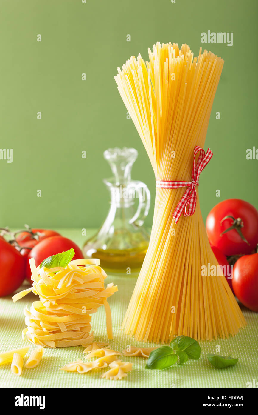 raw pasta olive oil tomatoes. italian cuisine Stock Photo Alamy