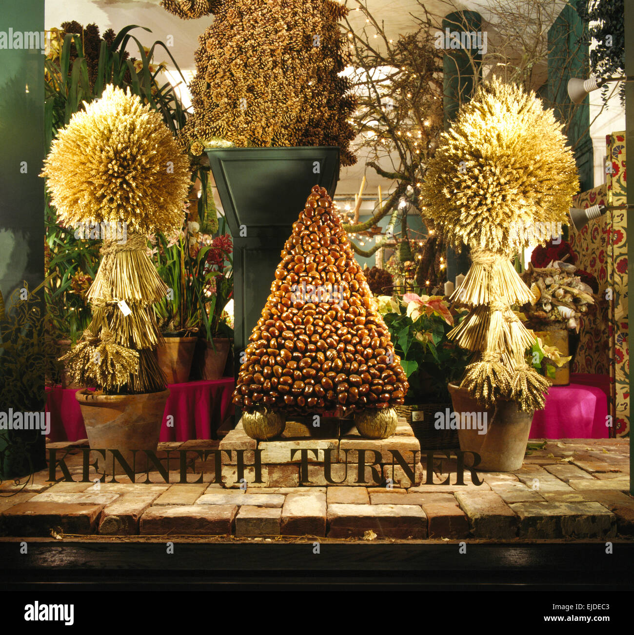 Closeup of formal arrangements in the window of Turner's shop