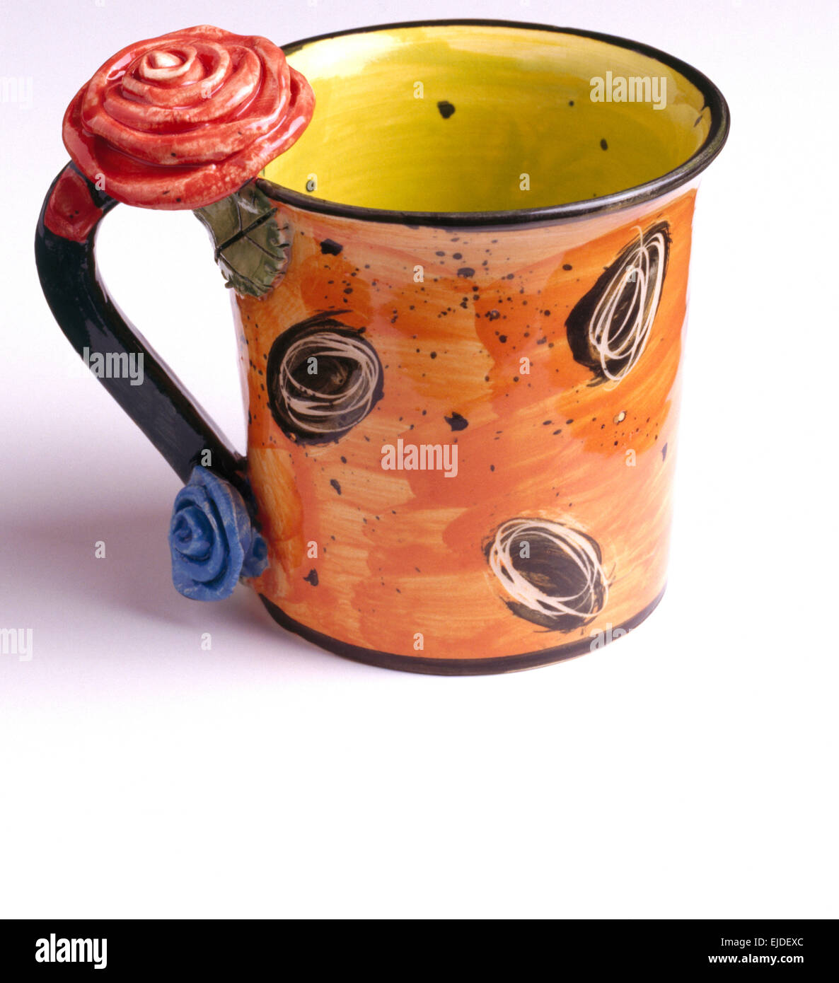 Colorful pottery mug designed by Mary-Rose Young Stock Photo