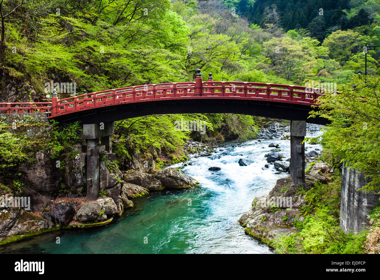 Red sacred bridge Shinkyo in UNESCO site of Nikko, Japan Stock Photo