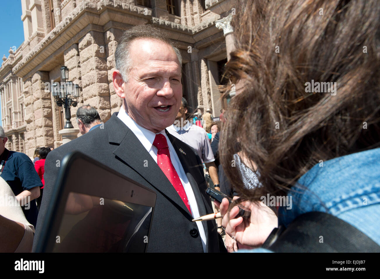 Austin, Texas, USA. 23rd March, 2015. Controversial  Alabama Supreme Court Chief Justice Roy Moore speaks with a reporter at a rally of conservative Texas legislators opposing gay marriage at a Texas Capitol rally Monday.  Moore has told Alabama judges to ignore a recent federal court ruling allowing gay marriage in the state. Credit:  Bob Daemmrich/Alamy Live News Stock Photo