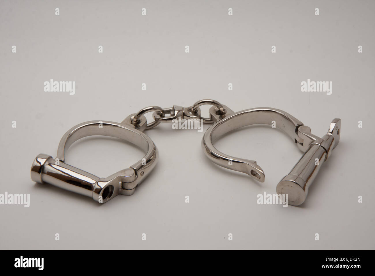 old handcuffs with locking screw English style Stock Photo Alamy