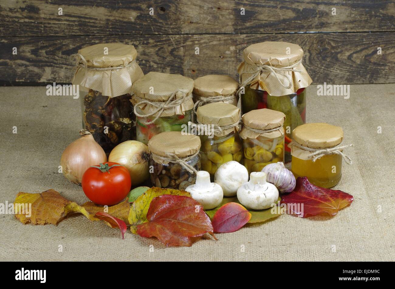 jars of preserved canned vegetable and honey Stock Photo