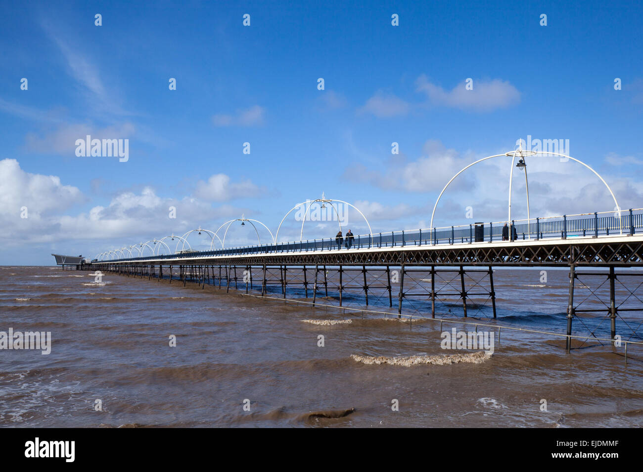 Southport, Merseyside, UK. 24th March, 2015. UK Weather: Bright Sunny Day and Very rare high tide comes in on Southport beach. Credit:  Mar Photographics/Alamy Live News Stock Photo