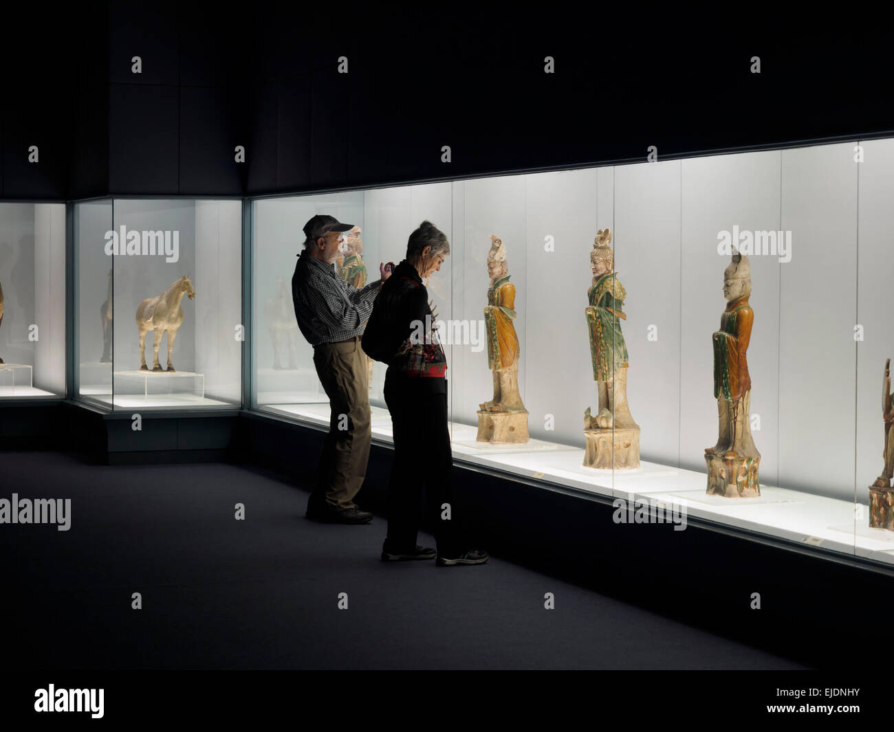 Person visiting the Gallery of Ancient Chinese Sculpture at the Shanghai Museum in Shanghai, China Stock Photo