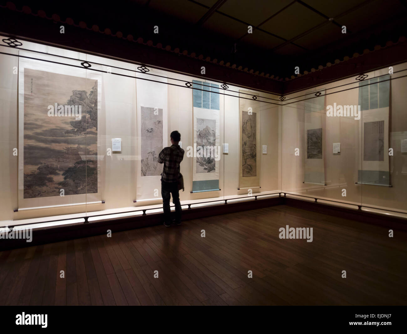 Person visiting the Gallery of Ancient Chinese Paintings at the Shanghai Museum in Shanghai, China Stock Photo