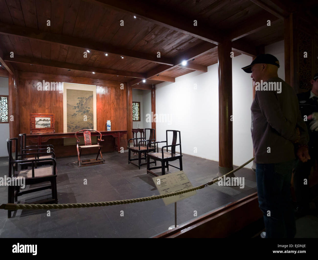Person visiting the Gallery of Chinese furniture in Ming and Qing dynasties at the Shanghai Museum in Shanghai, China Stock Photo