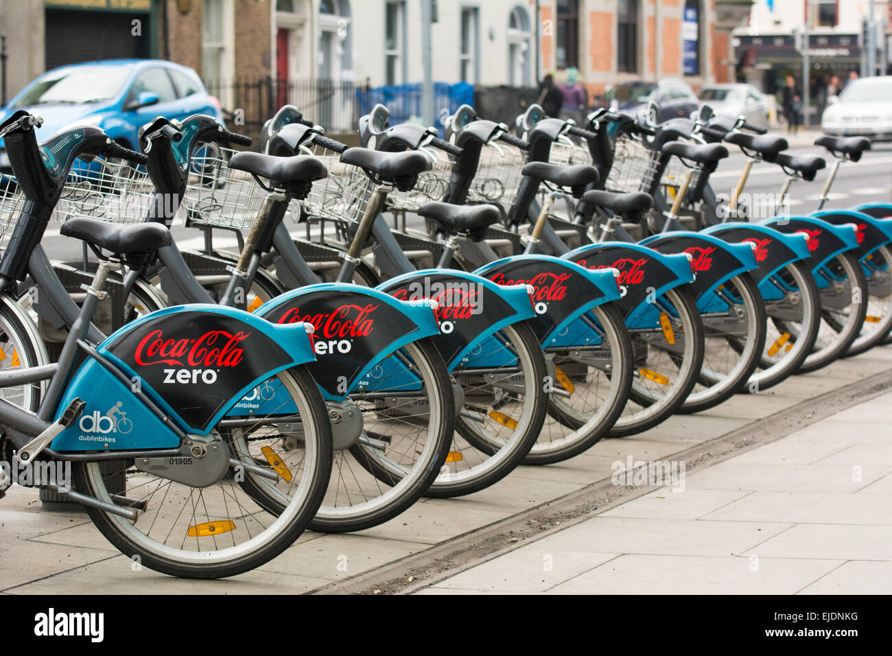 Dublin Bike Scheme bicycles lined up at station sponsored by Coca Cola Zero Stock Photo