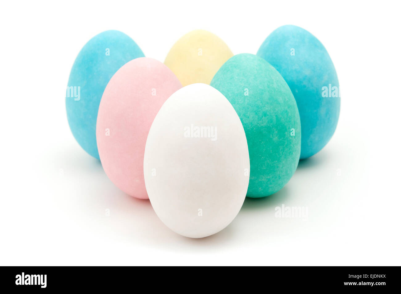 Egg shaped Easter sweets on a white background Stock Photo