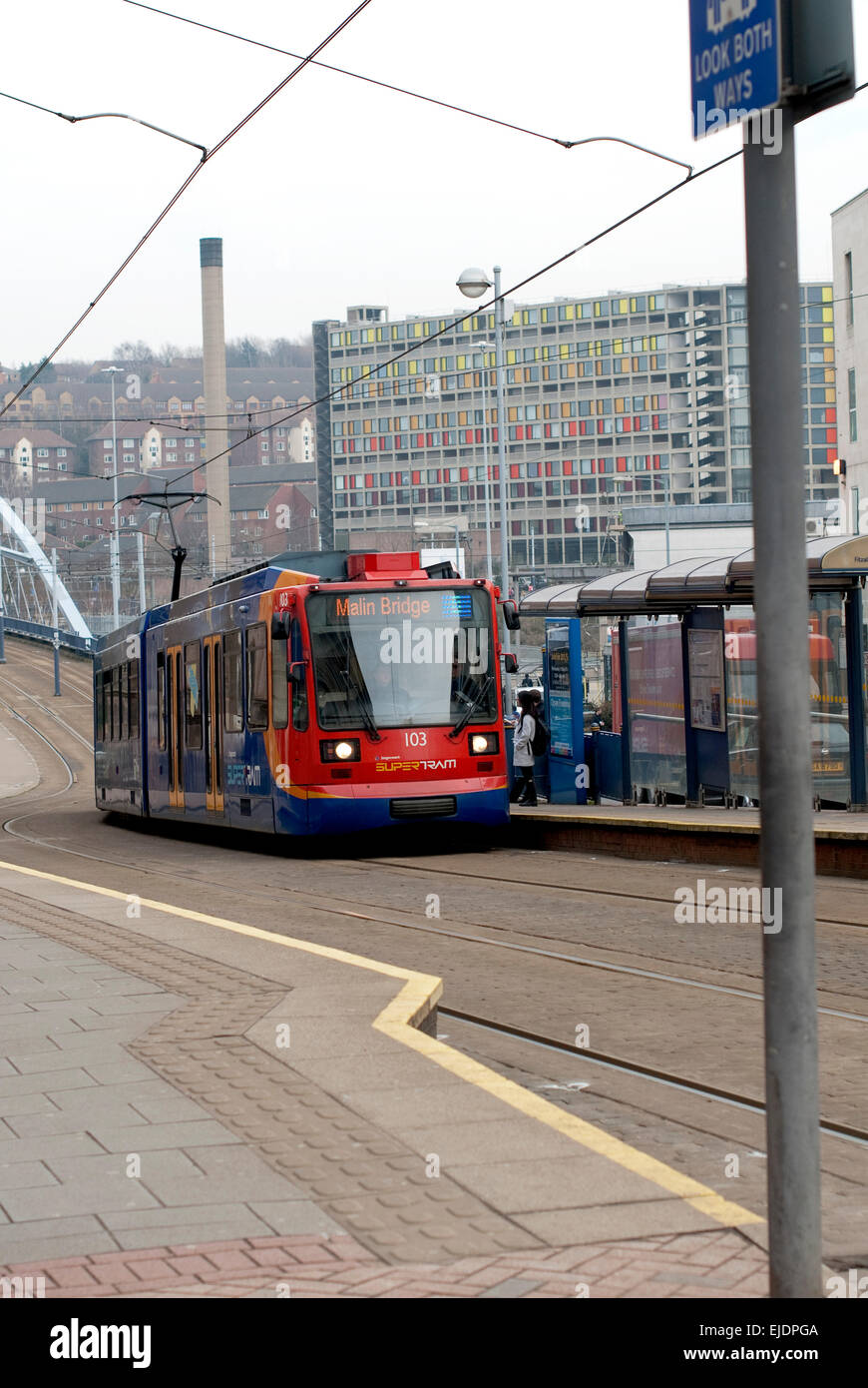 Documentary image from around  Sheffield showing the Malin Bridge Sheffield Supertram departing from Fitzalan Square. Stock Photo