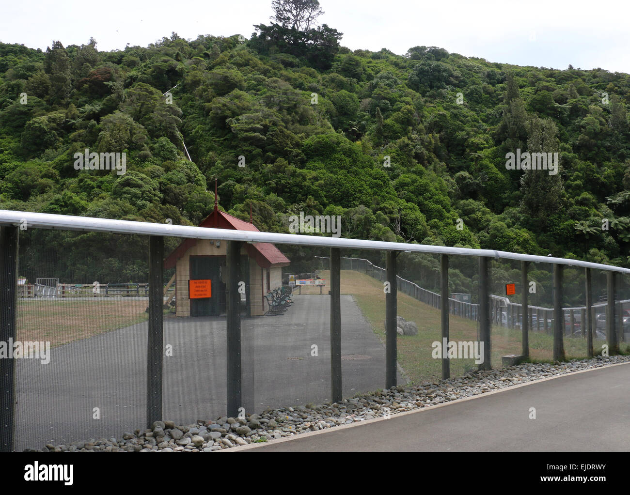 Predator exclusion fence at Zealandia eco attraction park Wellington, New Zealand Stock Photo