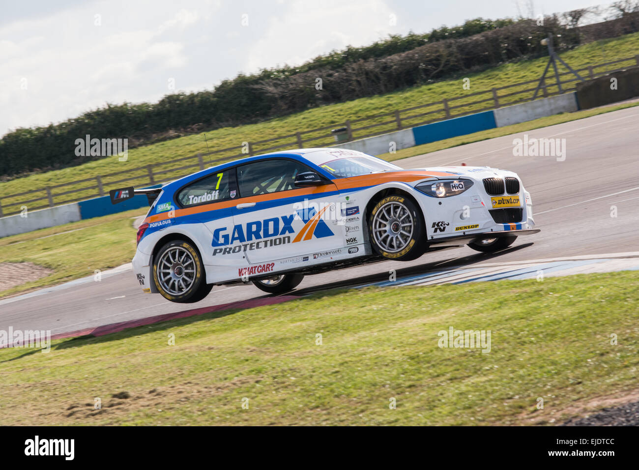 Castle Donnington, UK. 24th March, 2015. Sam Tordoff in the West Surrey Racing BMW 1-Series in action during the 2015 Dunlop MSA British Touring Car Championship media day at Donington Park on March 24, 2015 in Castle Donington, England. Credit:  Gergo Toth/Alamy Live News Stock Photo