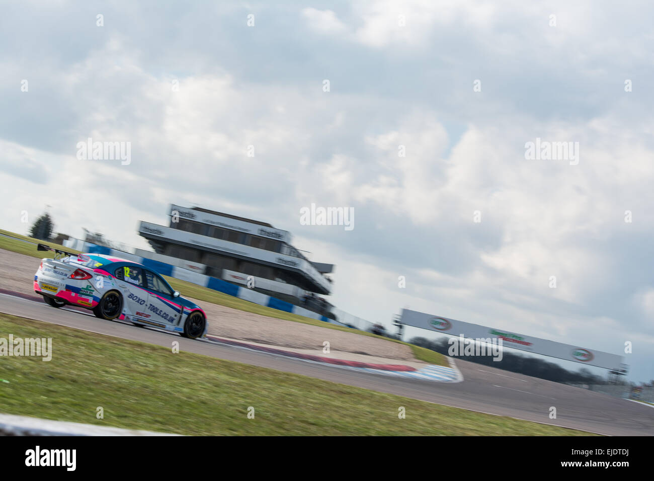 Castle Donnington, UK. 24th March, 2015. Andy Wilmot in the Welch Motorsport Proton Gen-2 in action during the 2015 Dunlop MSA British Touring Car Championship media day at Donington Park on March 24, 2015 in Castle Donington, England. Credit:  Gergo Toth/Alamy Live News Stock Photo