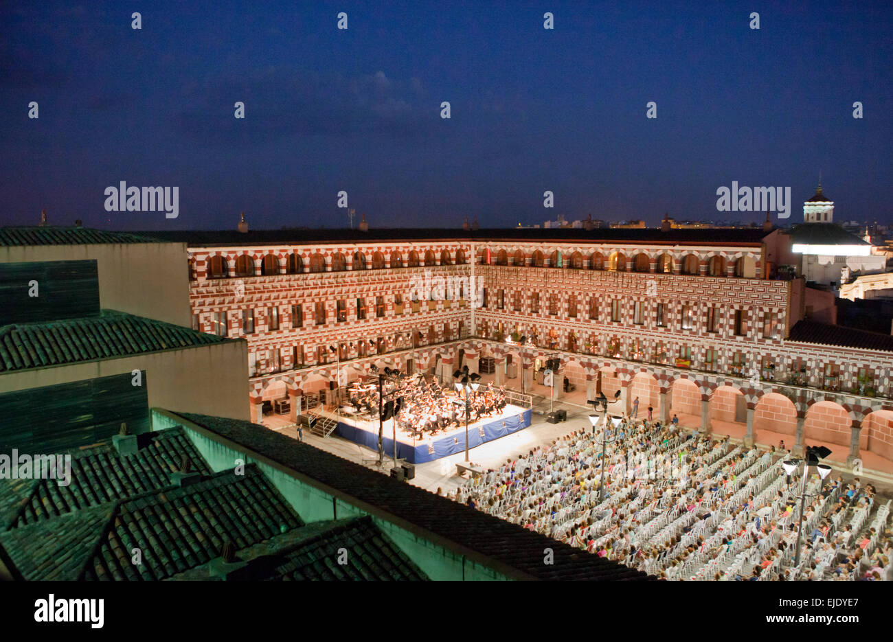 The Extremadura Region Classical Music Orchestra performs at the Hight Square of Badajoz, Spain. Aerial view from the citadel to Stock Photo
