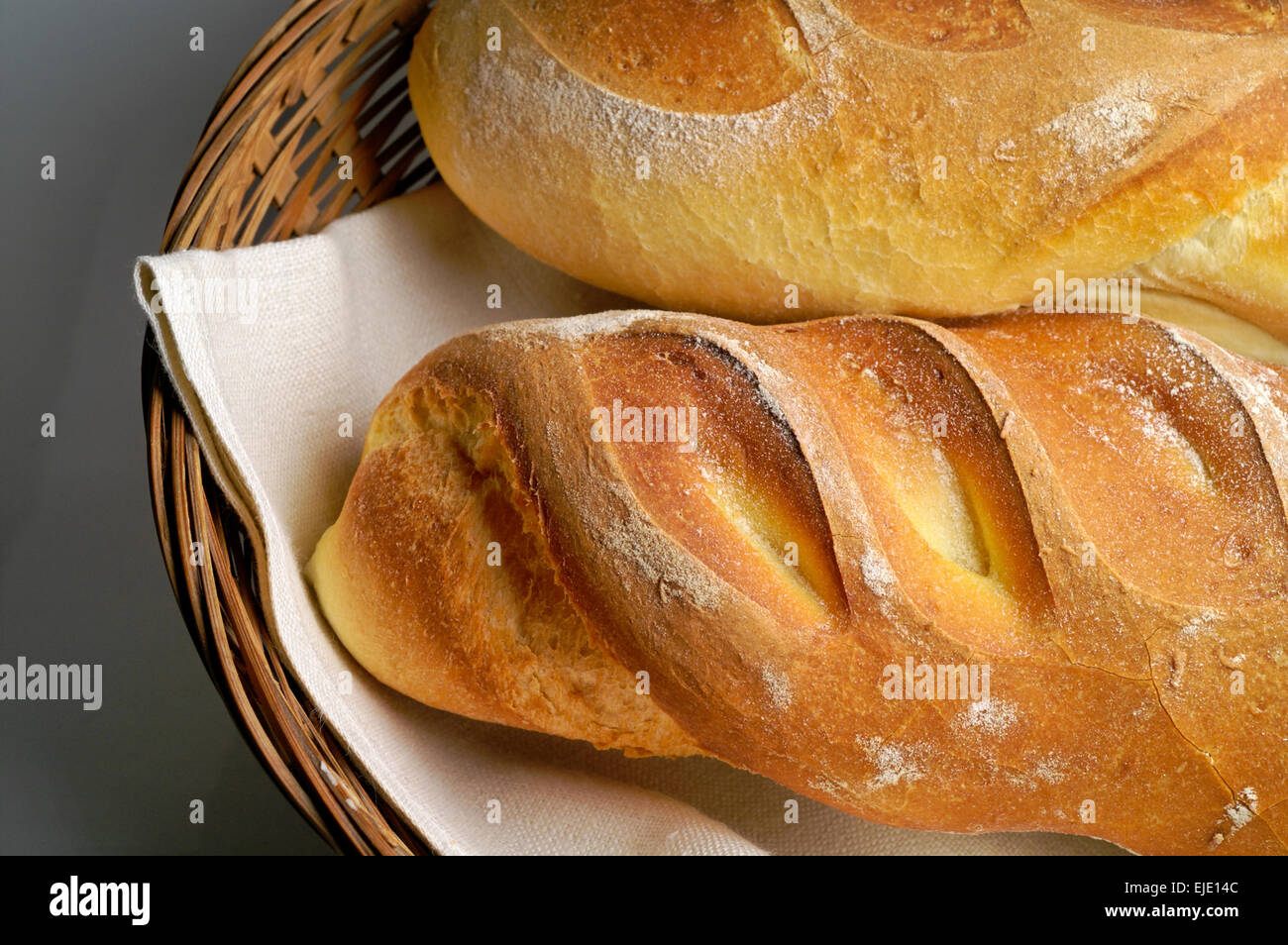 Durum wheat bred rolls in basket Stock Photo