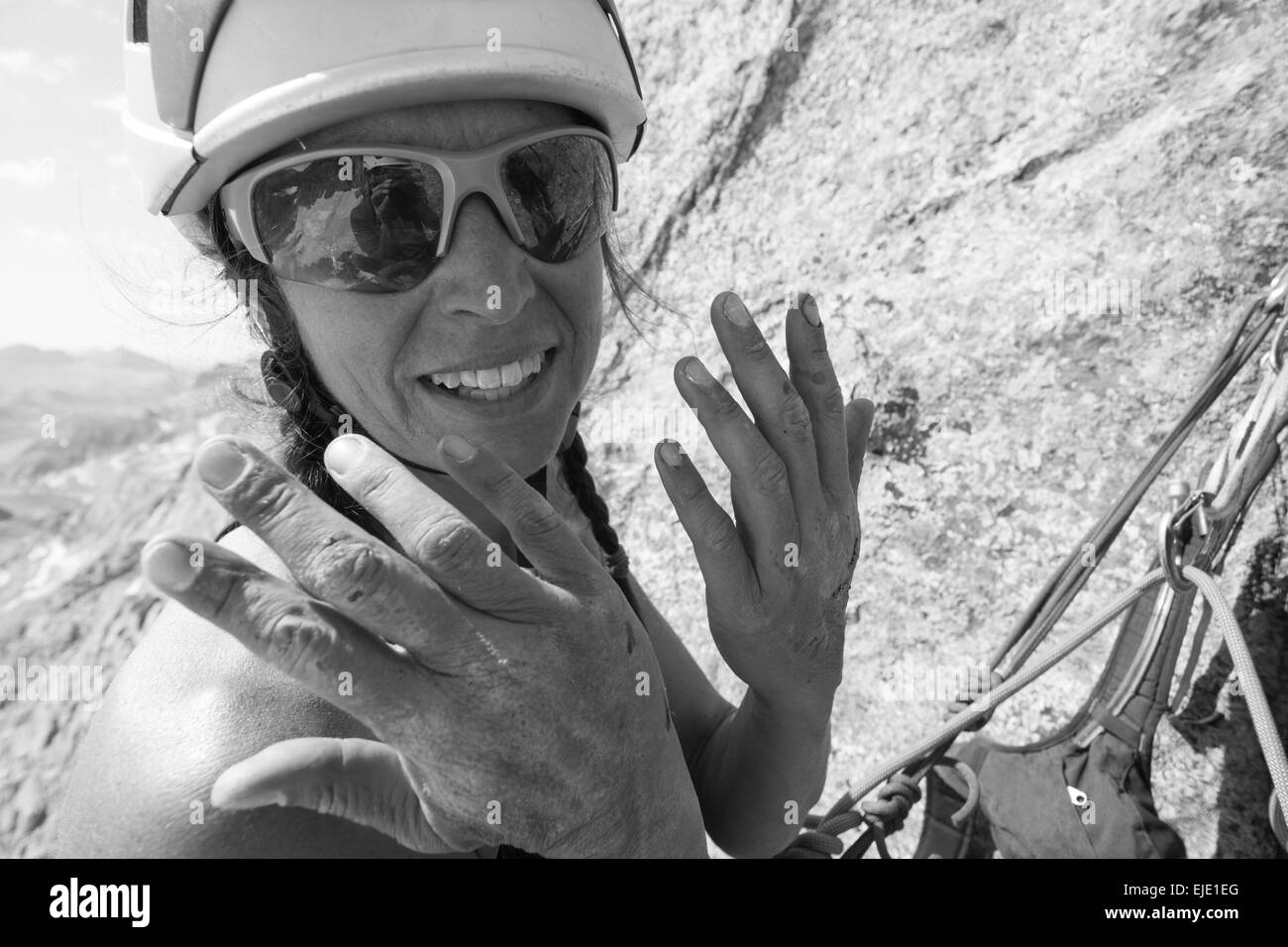 A woman rock climber in Titcomb Basin, Wind River Range, Pinedale, Wyoming. Stock Photo