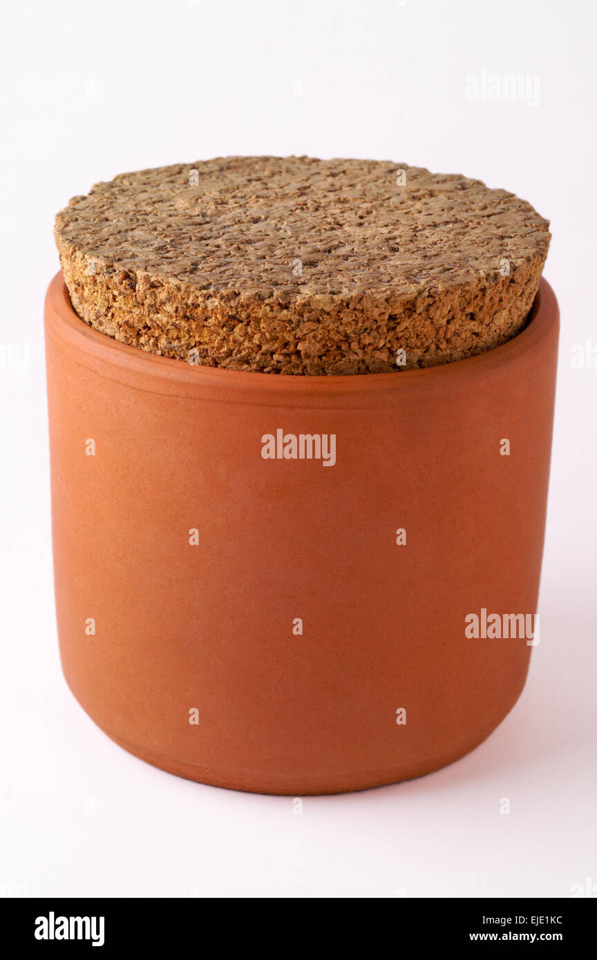 ceramic pot with cork cover isolated on white Stock Photo