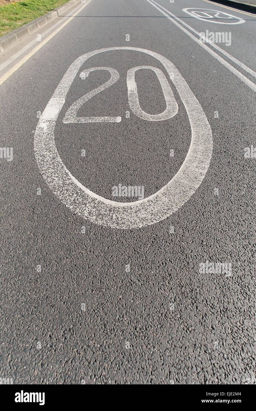 20mph road marking on a tarmac road Stock Photo