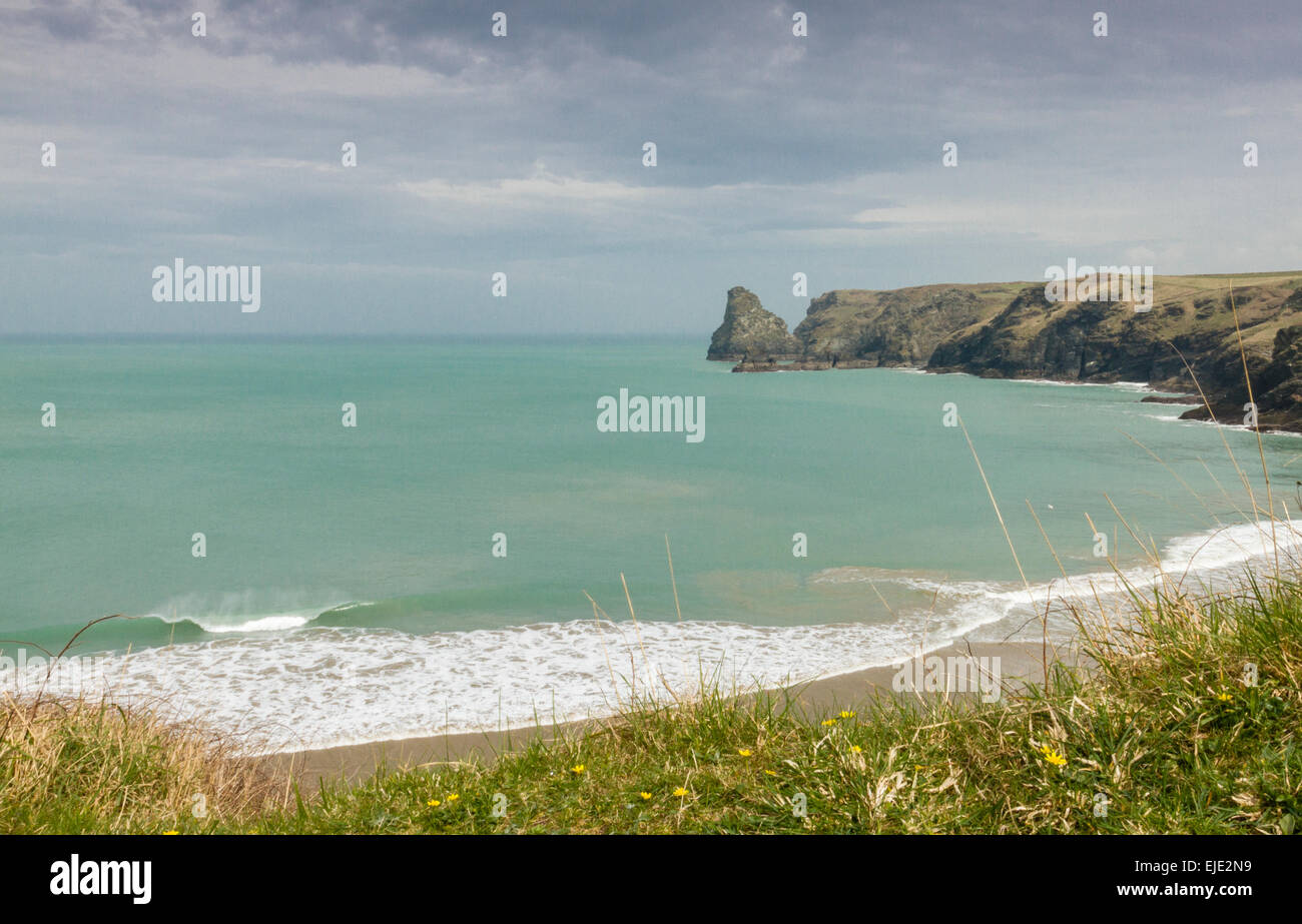 Looking down onto Bossiness Haven and Benoath Cove, near Tintagel, Cornwall Stock Photo