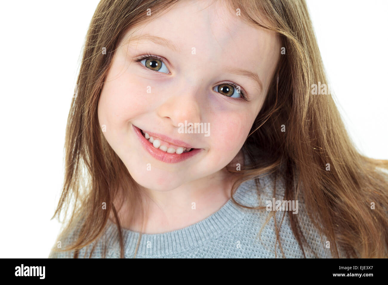 Close-up portrait of a beautiful little girl on white background Stock ...