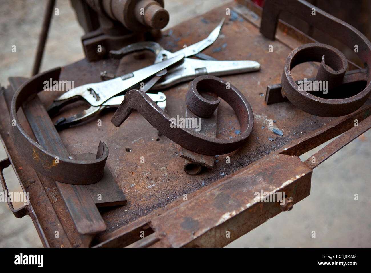 Tools and metals in an ironworks shop Stock Photo