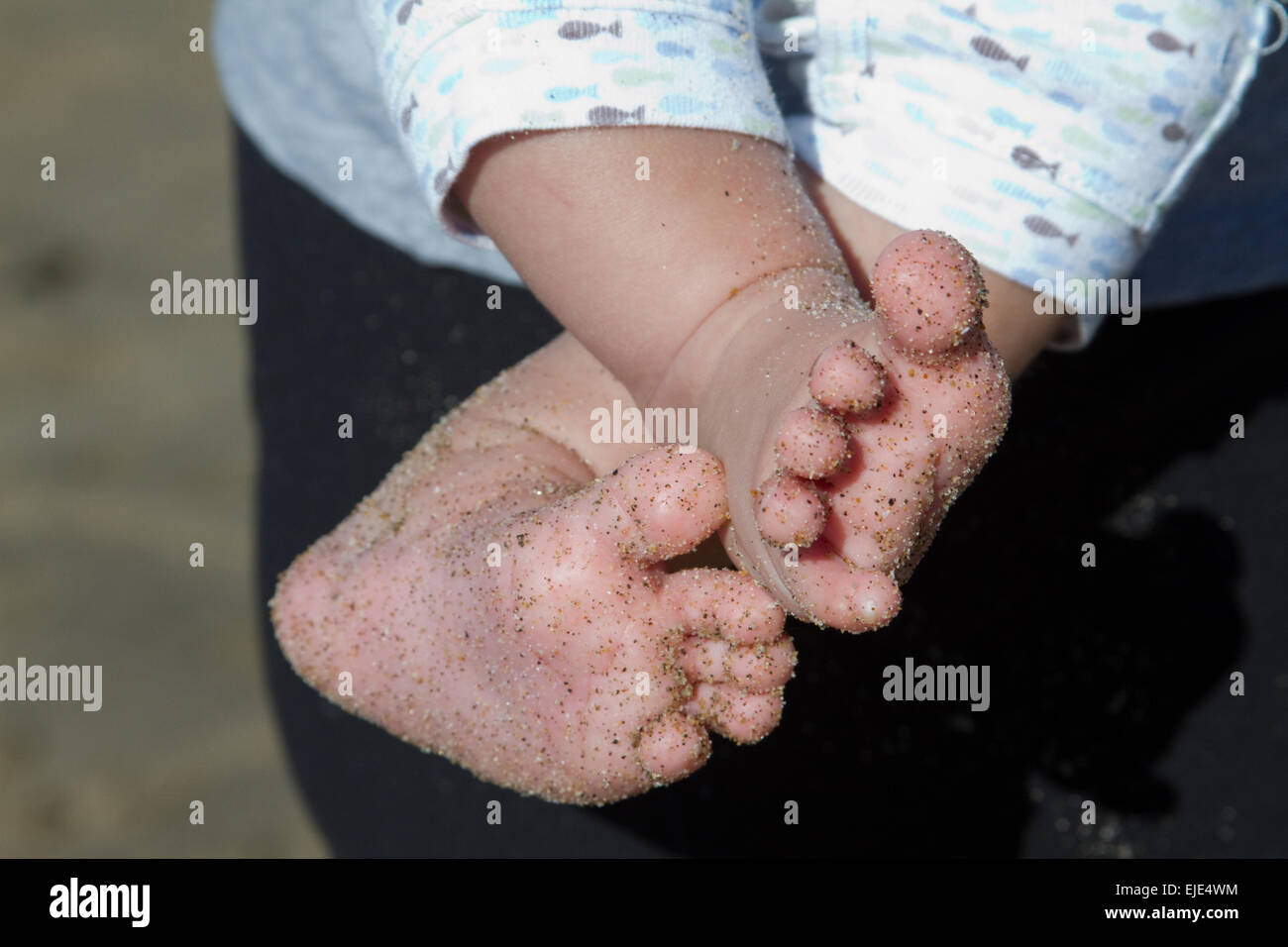 Sandy Baby Feet Stock Photo