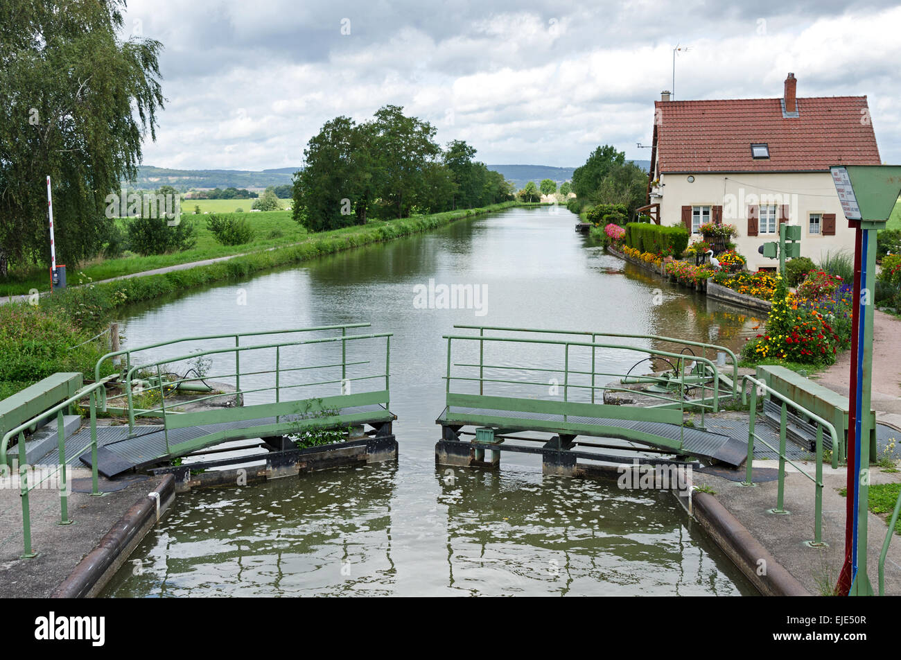 Exiting a lock on the Canal du Centre, Saône-et-Loire, Burgundy, France. Stock Photo