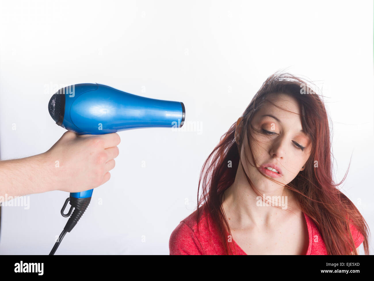 Sensual Young Woman Blow Dry her Long Hair Stock Photo - Alamy