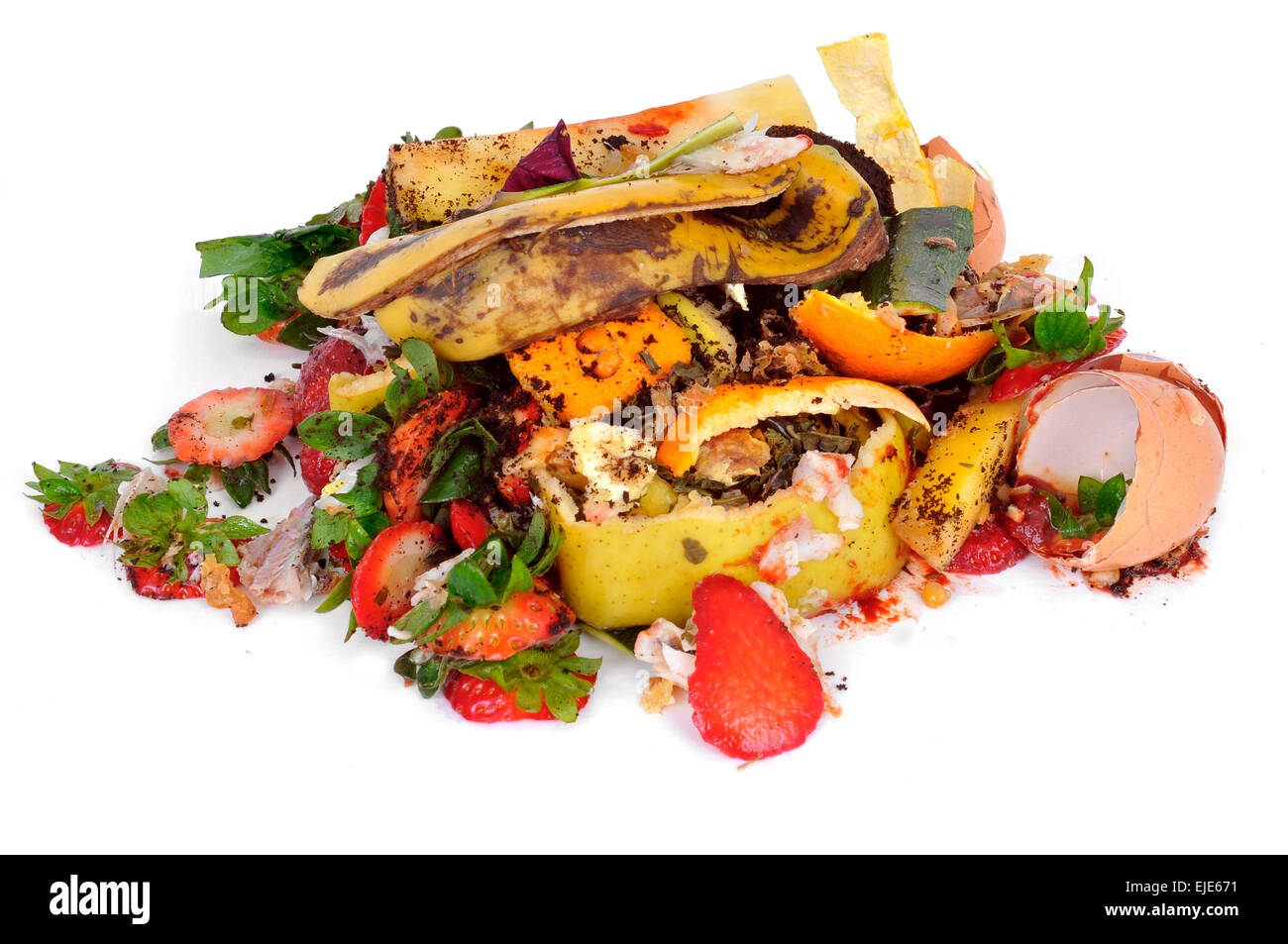 a pile of food waste, such as eggshells and fruit and vegetable peels, on a white background Stock Photo