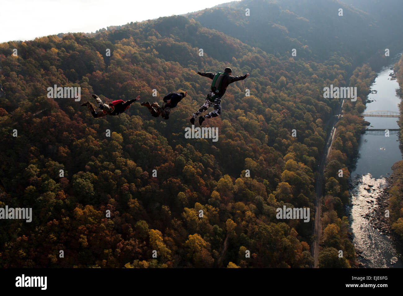 ASE jumpers huck themselves off the New River Gorge bridge in Lafayette, WV for Bridge Day. Stock Photo