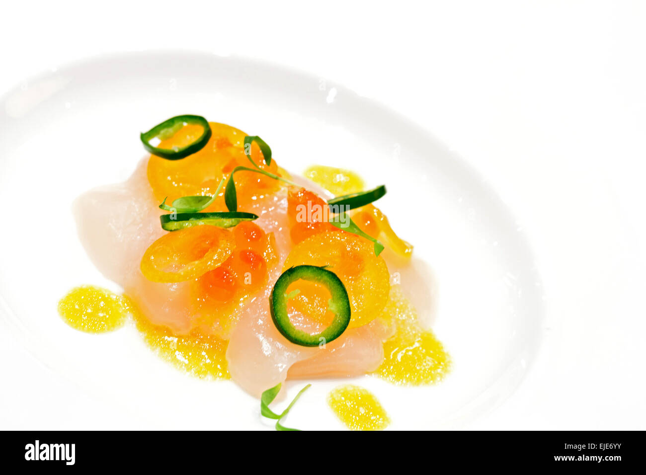 Hokkaido scallop carpaccio with passion fruit Stock Photo Alamy