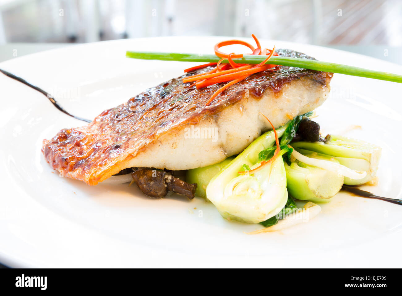 grilled barramundi steak with sweet sauce Stock Photo Alamy