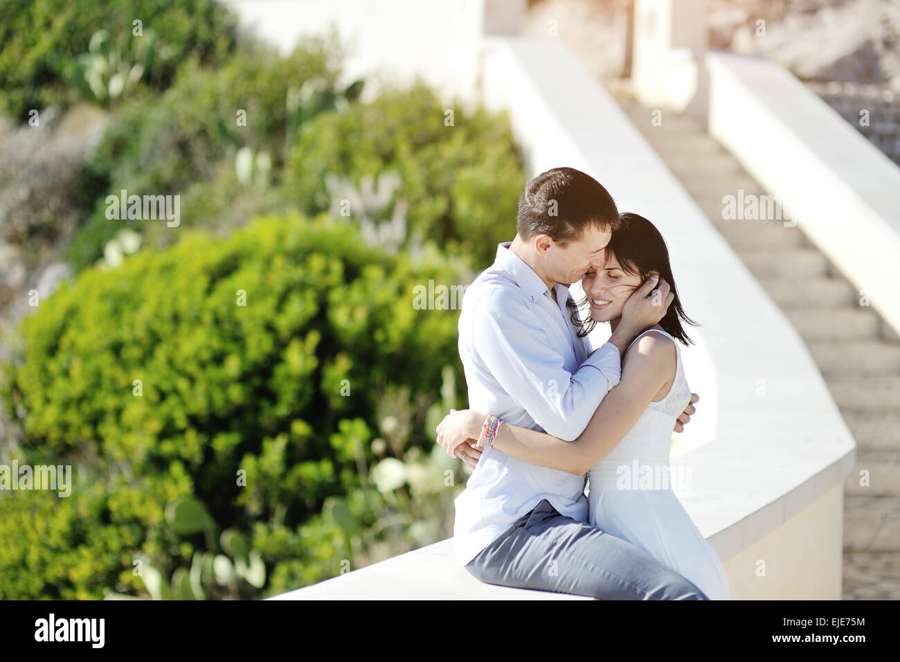 Happy newlywed couple tenderly hi-res stock photography and images - Alamy