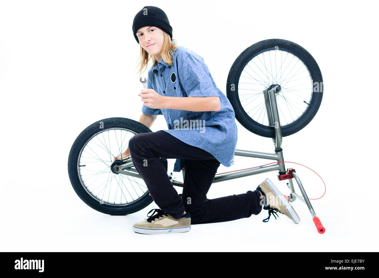 Bicycle Boy on BMX bike isolated on white Stock Photo