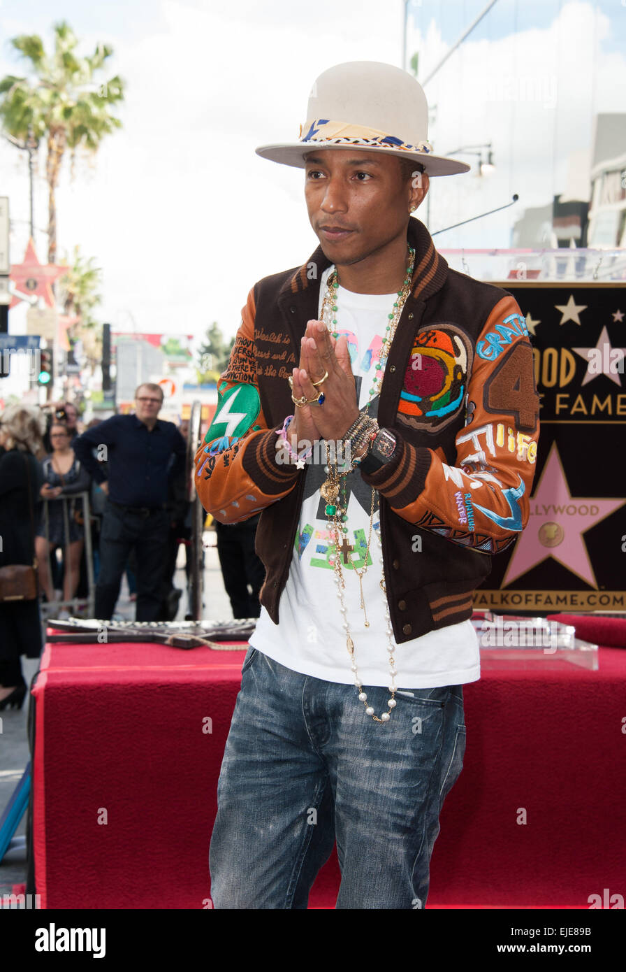 LOS ANGELES, CA - DECEMBER 4, 2014: Singer/songwriter Pharrell Williams on Hollywood Boulevard where he was honored with the 2,537th star on the Hollywood Walk of Fame. Stock Photo