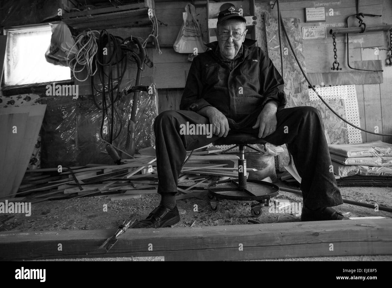 Patsy Christie of Englishtown, Nova Scotia constructs what will be his last wooden boat. Stock Photo