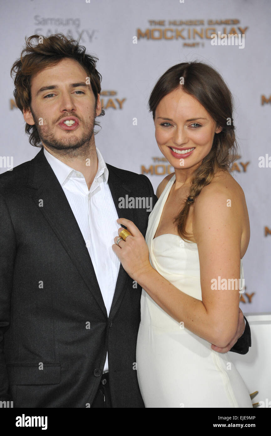 LOS ANGELES, CA - NOVEMBER 17, 2014: Sam Claflin \u0026 wife Laura Haddock at  the Los Angeles, image size:865x1390