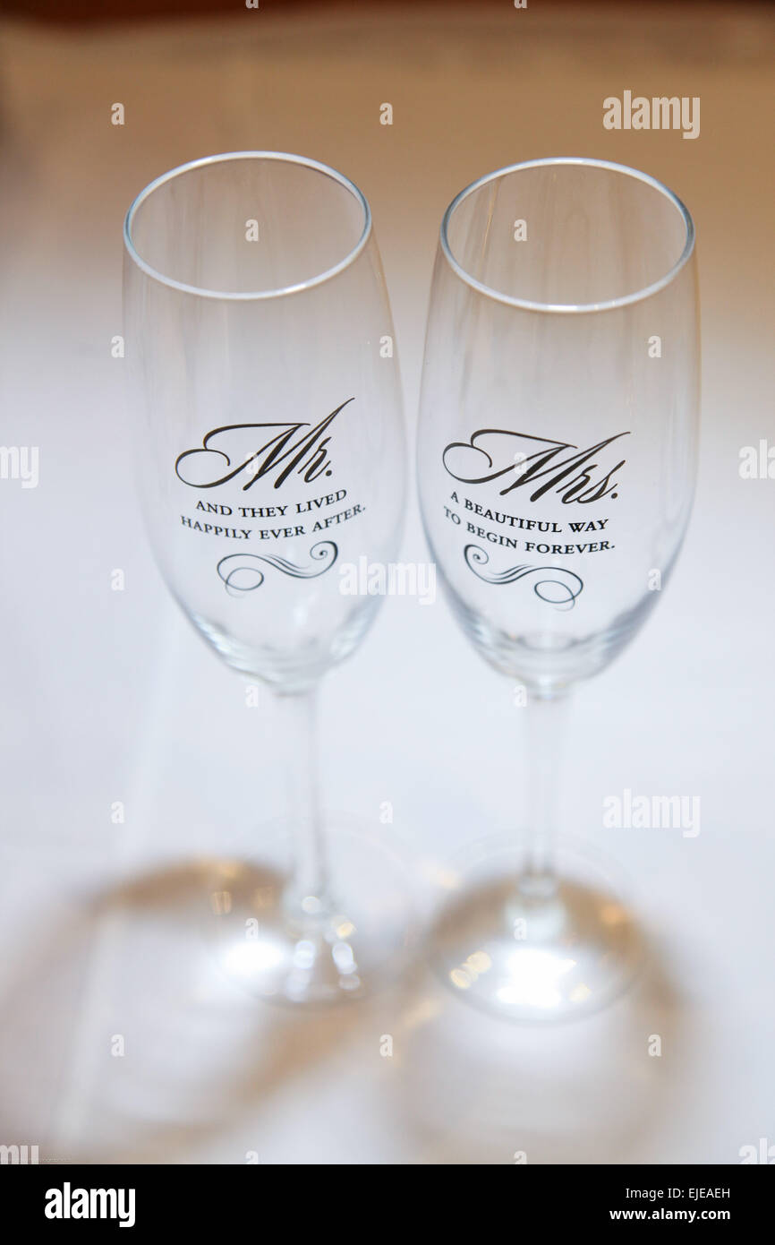 https://c8.alamy.com/comp/EJEAEH/mr-and-mrs-champaign-flutes-at-a-wedding-EJEAEH.jpg