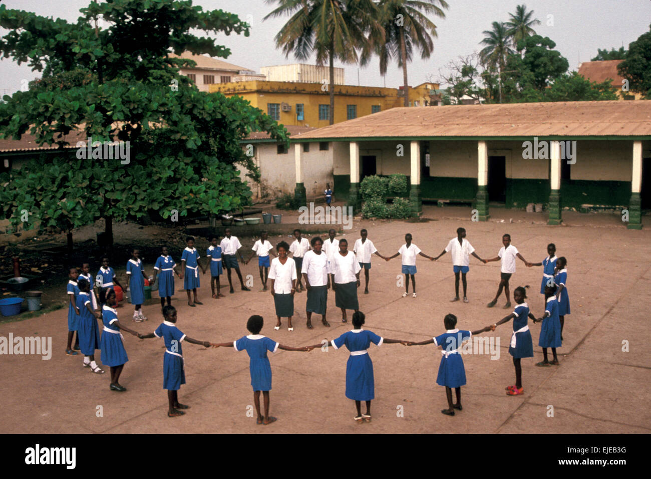 Pupils forming a circle outside a Catholic church school in Gambia, West Africa Stock Photo