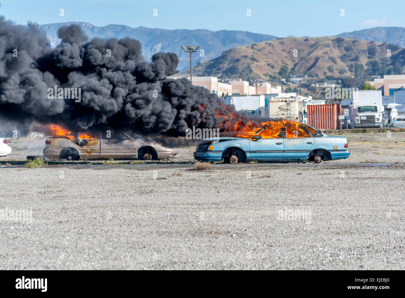 Burbank, California, USA. 24th March, 2015.  Cars burn during the Triennial Full Scale Emergency Exercise at Bob Hope  Airport Credit:  Chester Brown/Alamy Live News Stock Photo